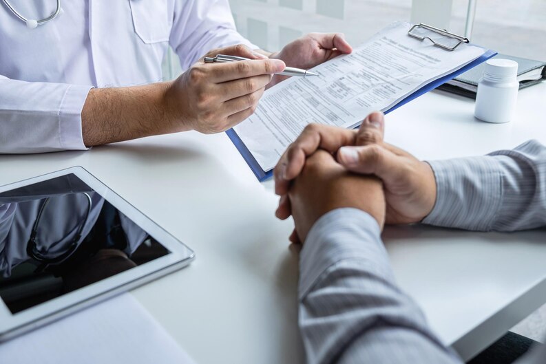 Doctor guiding the patient how to take in the medication