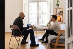 Patient consulting a therapist about his mental health situation