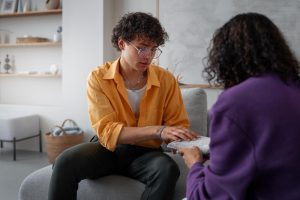 Therapist conducting treatment technique with a patient with OCD