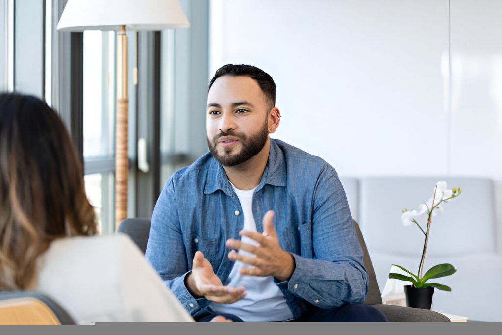 A client discusses his struggles in his life with a psychologist