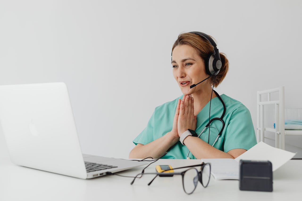Patient dealing with anxiety consulting to therapist through telehealth therapy