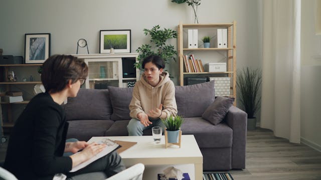 Therapist in an anxiety therapy session with a teenager